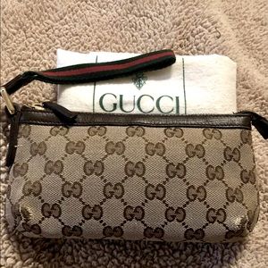 Authentic Gucci wristlet with dustbag. PRICE FIRM!